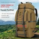Extra-large khaki hunting backpack with vertical compression straps standing in a mountain valley