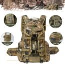 Side view of a woodland camo hydration hunting backpack showing dual compression straps and zippered hip belt pockets