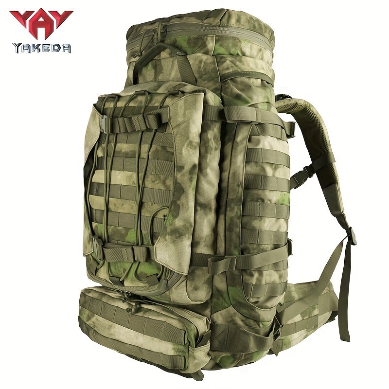 Front view of green-dominant camo waterfowl hunting backpack showing MOLLE webbing and front zippered pocket