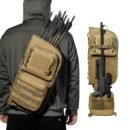 Tan tactical rifle hunting backpack worn crossbody on a hunter showing the slim vertical sling profile
