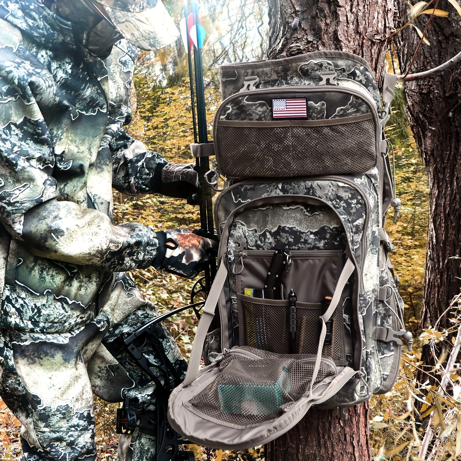 Top detail of the compound bow carry system and padded handle on a rocky camo archery pack
