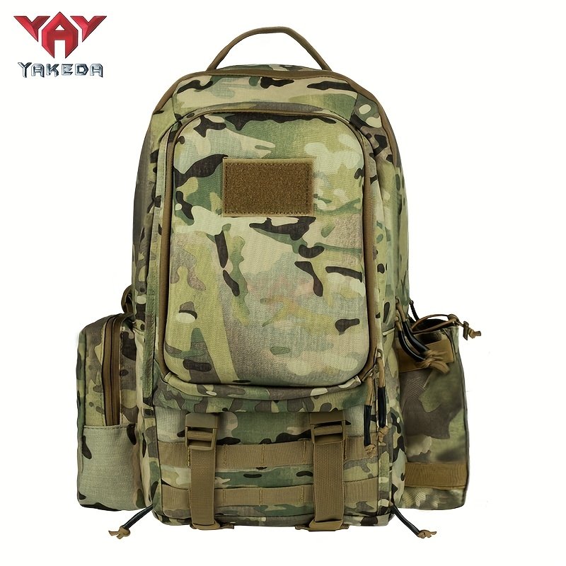 Front view of a multicam saddle hunting backpack setup showing MOLLE webbing and dual compression straps
