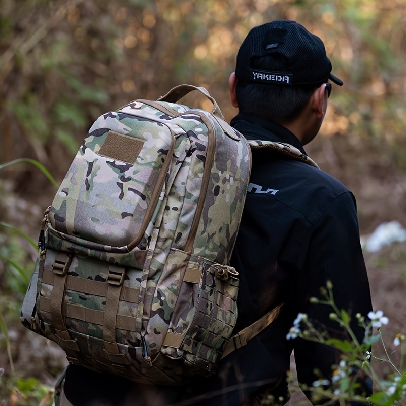 Side angle of the best saddle hunting backpack with asymmetrical pockets and corded zipper pulls
